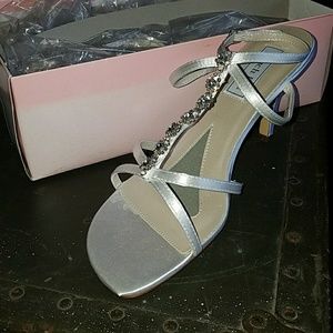 Strappy white and rhinestone heels